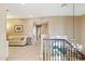 Upstairs hallway with light flooring and chandelier at 1438 W Coral Reef Dr, Gilbert, AZ 85233