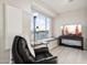Relaxing sitting area with lake view and comfortable armchair at 1438 W Coral Reef Dr, Gilbert, AZ 85233