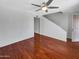 Living room featuring wood floors and a ceiling fan at 1750 E Mateo Cir # 103, Mesa, AZ 85204