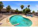 Community pool with surrounding patio and lounge chairs at 1750 E Mateo Cir # 103, Mesa, AZ 85204