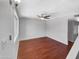 Living area with wood floors and a ceiling fan at 1750 E Mateo Cir # 103, Mesa, AZ 85204