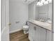 Bathroom with granite vanity and white cabinets at 1750 E Mateo Cir # 103, Mesa, AZ 85204
