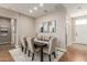 Formal dining room with six chairs and a large table at 11225 E Ocaso Ave, Mesa, AZ 85212