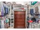 Large walk-in closet with ample shelving and drawers at 11225 E Ocaso Ave, Mesa, AZ 85212