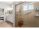 Bathroom with walk-in shower and double vanity at 11225 E Ocaso Ave, Mesa, AZ 85212