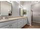 Double vanity bathroom with a walk-in shower at 11225 E Ocaso Ave, Mesa, AZ 85212