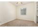 Bright bedroom with ceiling fan and neutral carpeting at 22769 E Orion Way, Queen Creek, AZ 85142