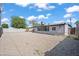 Home's back exterior, large gravel backyard at 632 N 72Nd Pl, Scottsdale, AZ 85257