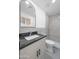 Updated bathroom with gray tile, new vanity, and modern fixtures at 632 N 72Nd Pl, Scottsdale, AZ 85257