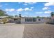 View of home's back and side, large gravel backyard at 632 N 72Nd Pl, Scottsdale, AZ 85257