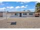 Single-story home with a gray exterior and a gravel front yard at 632 N 72Nd Pl, Scottsdale, AZ 85257