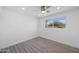 Bright bedroom with wood-look floors and large window at 632 N 72Nd Pl, Scottsdale, AZ 85257