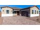 One-story home with a brown garage door, a paved driveway, and desert landscaping at 16348 W Avenida Del Sol --, Surprise, AZ 85387
