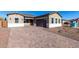 Front exterior view of a single-story house with a brown garage door and a paved driveway at 16348 W Avenida Del Sol --, Surprise, AZ 85387