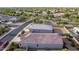 Aerial view of a house with a pool in a residential neighborhood at 285 S Espada Trl, Casa Grande, AZ 85194