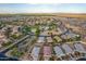 Aerial view of a community pool and surrounding neighborhood at 285 S Espada Trl, Casa Grande, AZ 85194
