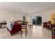 Living room with tiled floors and sliding glass door at 285 S Espada Trl, Casa Grande, AZ 85194