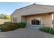 Backyard view of the home's exterior with patio and landscaping at 285 S Espada Trl, Casa Grande, AZ 85194