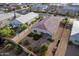 Single-story home with a large backyard and surrounding neighborhood view at 285 S Espada Trl, Casa Grande, AZ 85194