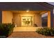 Covered patio with sliding glass doors offering views into the home's interior at 285 S Espada Trl, Casa Grande, AZ 85194