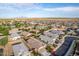 Aerial view of houses and a residential area with surrounding desert landscape at 285 S Espada Trl, Casa Grande, AZ 85194