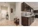 Bright and spacious entryway with tile flooring and a coat rack at 285 S Espada Trl, Casa Grande, AZ 85194