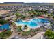 Aerial view showing a resort-style community pool with a waterslide at 285 S Espada Trl, Casa Grande, AZ 85194