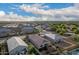 Aerial view of houses in a community, showcasing backyard and neighborhood at 285 S Espada Trl, Casa Grande, AZ 85194