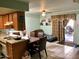 Kitchen features a dining area and access to a patio at 605 N Lesueur Cir, Mesa, AZ 85203