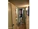 Hallway with access to bedrooms and bathroom at 605 N Lesueur Cir, Mesa, AZ 85203