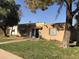Brick home with walkway and mature trees at 605 N Lesueur Cir, Mesa, AZ 85203