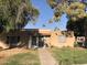 Brick home with a well maintained yard at 605 N Lesueur Cir, Mesa, AZ 85203