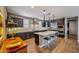 Modern kitchen with dark cabinetry, white subway tile backsplash, and large island at 18009 E Silver Sage Ln, Rio Verde, AZ 85263