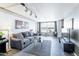 Spacious living room with large windows and city view at 535 W Thomas Rd # 503, Phoenix, AZ 85013