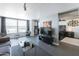 Open concept living room with modern furnishings and kitchen at 535 W Thomas Rd # 503, Phoenix, AZ 85013