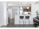 Kitchen with breakfast bar and access to living area at 535 W Thomas Rd # 503, Phoenix, AZ 85013