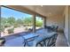 Covered patio with seating area overlooking the backyard at 5074 N Scottsdale Rd, Eloy, AZ 85131