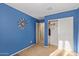 Bedroom with a closet and door to bathroom at 8690 S 253Rd Ave, Buckeye, AZ 85326