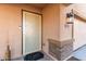 Front door with security screen and a stone accent at 8690 S 253Rd Ave, Buckeye, AZ 85326
