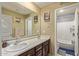 Bathroom with double sinks and a shower/tub combo at 8690 S 253Rd Ave, Buckeye, AZ 85326