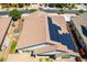 Aerial view highlighting a house with solar panels at 23392 S 209Th Pl, Queen Creek, AZ 85142