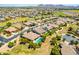 Aerial view showcasing a community with various homes at 23392 S 209Th Pl, Queen Creek, AZ 85142