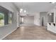 Open dining area with tile floor and views to living room at 23392 S 209Th Pl, Queen Creek, AZ 85142