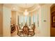 Formal dining area with a round table and ornate chairs at 9233 S Krista E Dr, Goodyear, AZ 85338