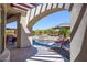Partial view of the pool and spa from under a pergola at 9233 S Krista E Dr, Goodyear, AZ 85338