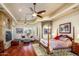Spacious main bedroom with hardwood floors, fireplace, and sitting area at 9233 S Krista E Dr, Goodyear, AZ 85338