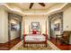 Elegant Primary bedroom with a four-poster bed and hardwood floors at 9233 S Krista E Dr, Goodyear, AZ 85338
