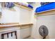 Spacious walk-in closet with ample shelving and hanging space at 9233 S Krista E Dr, Goodyear, AZ 85338