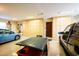 Spacious garage with overhead storage and room for two cars at 9233 S Krista E Dr, Goodyear, AZ 85338