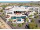 Luxury home with pool, spa, and solar panels; expansive desert landscaping at 9233 S Krista E Dr, Goodyear, AZ 85338